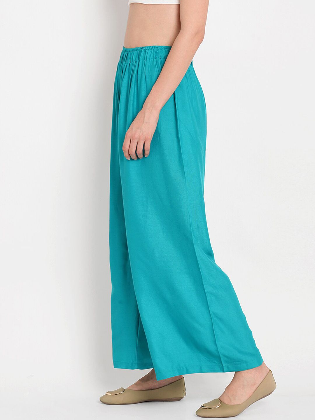 TAG 7 Women Turquoise Blue Solid Flared Palazzos | Grocsy