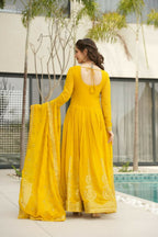 Vastranavya Yellow Faux Blooming with Embroidery Zari Sequins Work Gown | Grocsy