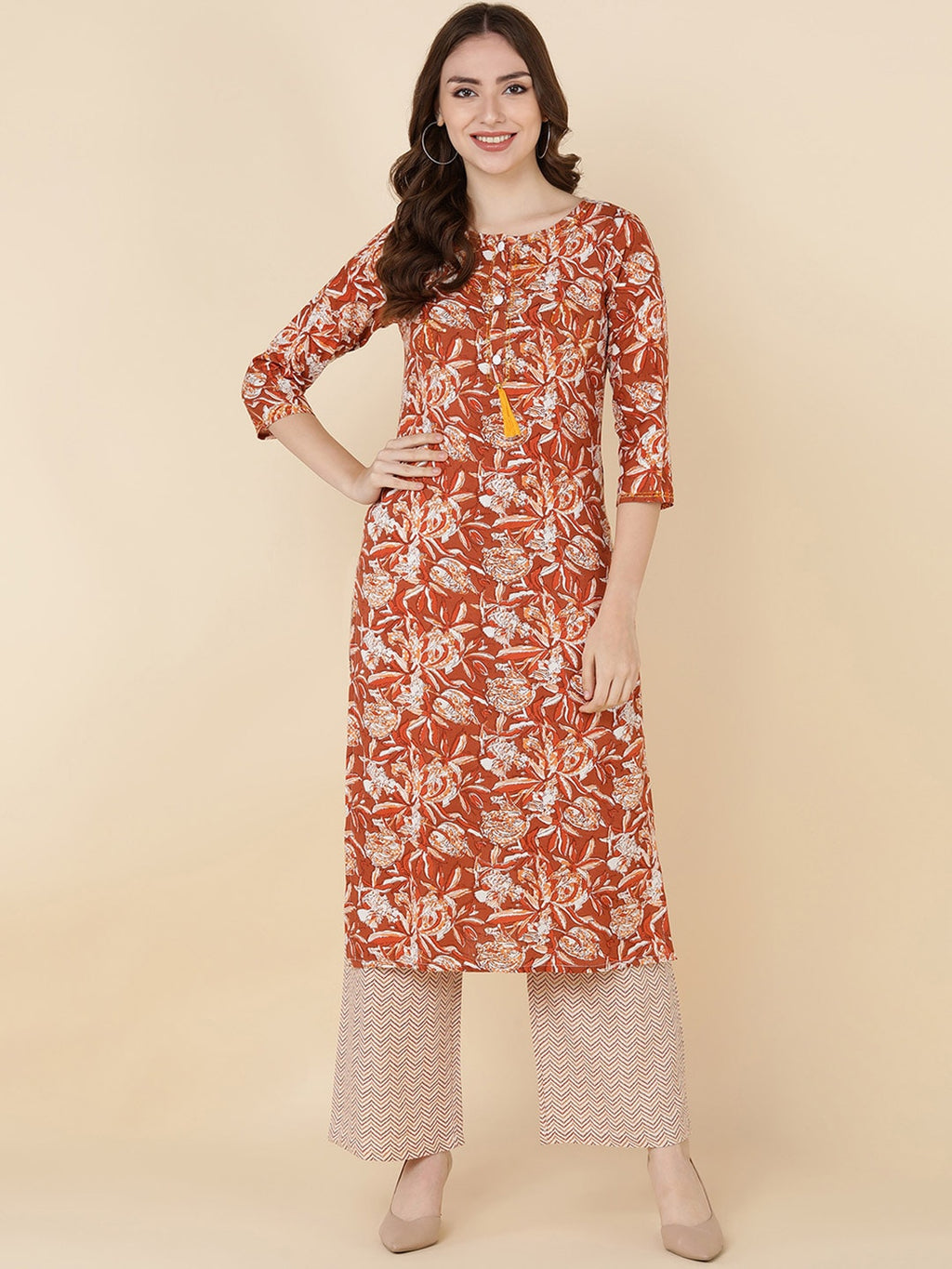 HERE&NOW Women Brown Floral Printed Sequinned Kurta with Trousers | Grocsy