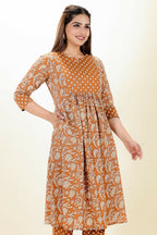 Aramya Orange Soft Cotton Floral Panelled Kurta for Women | Grocsy
