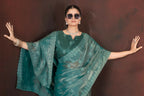 Vastranavya Teal Jimmy Choo Silk 3mm Sequence work with Cross Stitch Embroidery work & Cutwork Border Saree | Grocsy