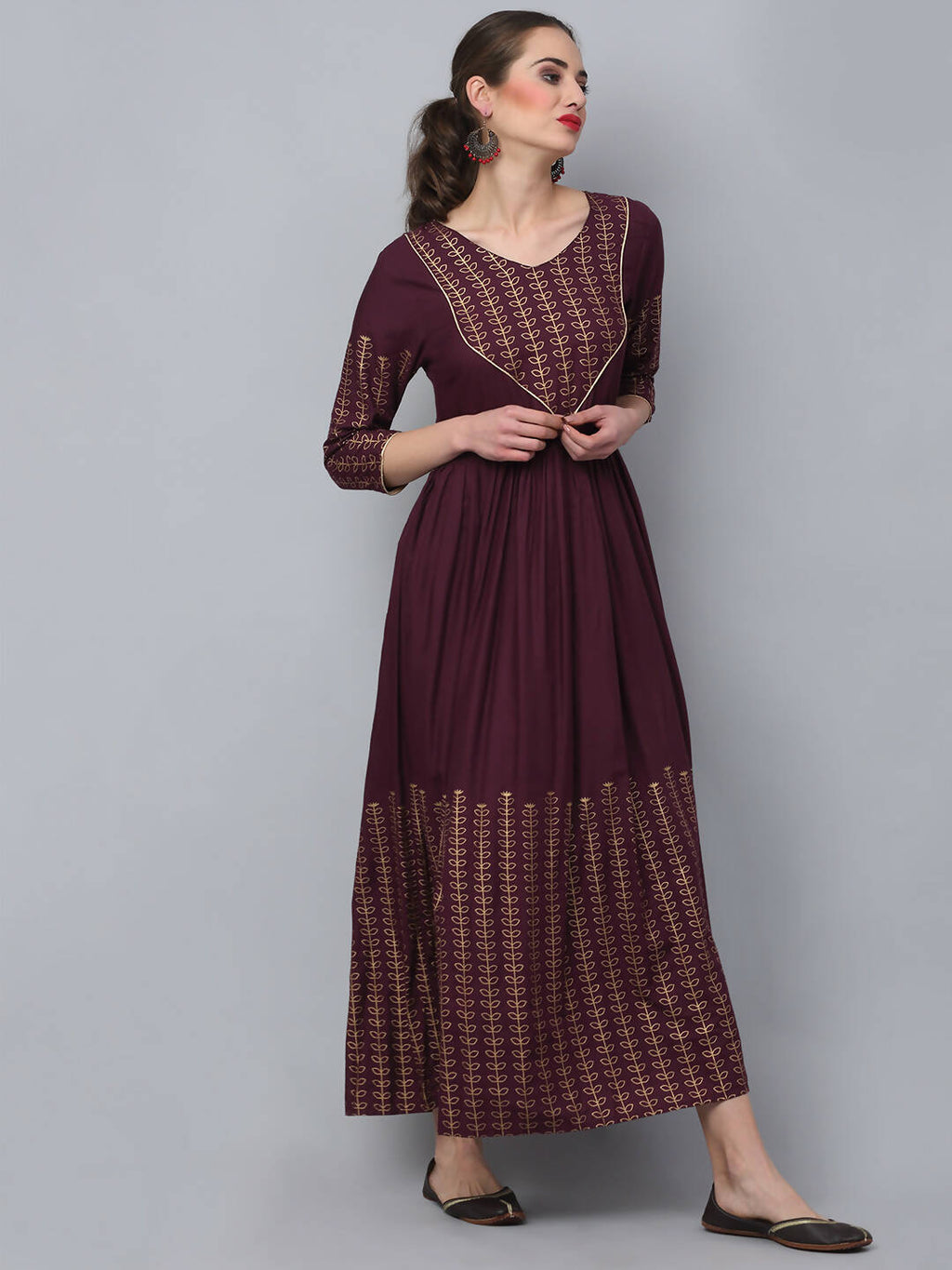 Rudra Bazaar Gold Printed A-Line Flared Brown Kurti | Grocsy