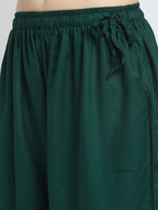 TAG 7 Women Green Solid Flared Palazzos | Grocsy
