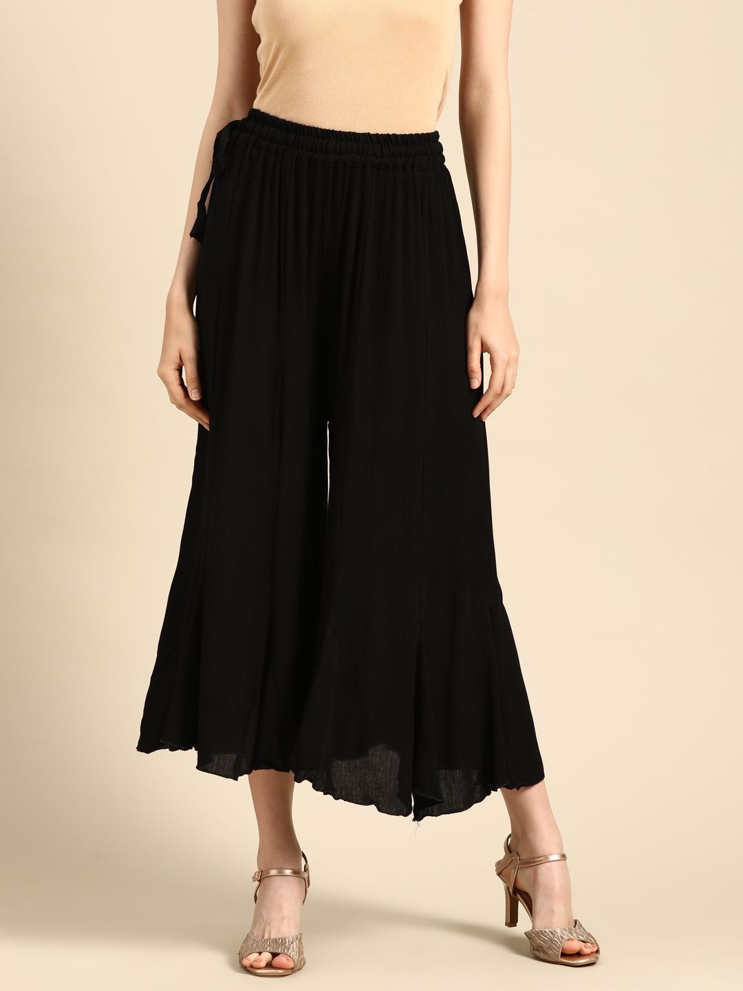 TAG 7 Women Black Solid Flared Cropped Palazzos | Grocsy
