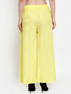 TAG 7 Women Yellow Solid Flared Ethnic Palazzos | Grocsy