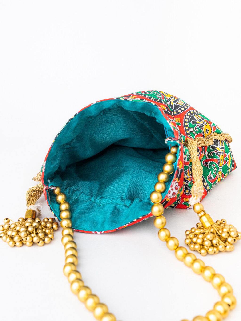 NR By Nidhi Rathi Red & Green Printed Potli Clutch | Grocsy