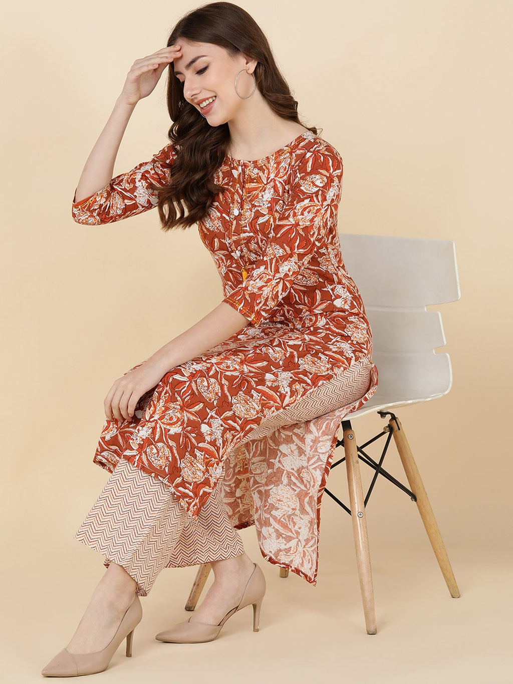 HERE&NOW Women Brown Floral Printed Sequinned Kurta with Trousers | Grocsy