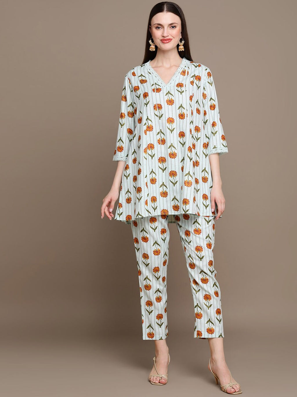 HERE&NOW Floral Printed Lace Inserted V-Neck Kurti with Trousers | Grocsy