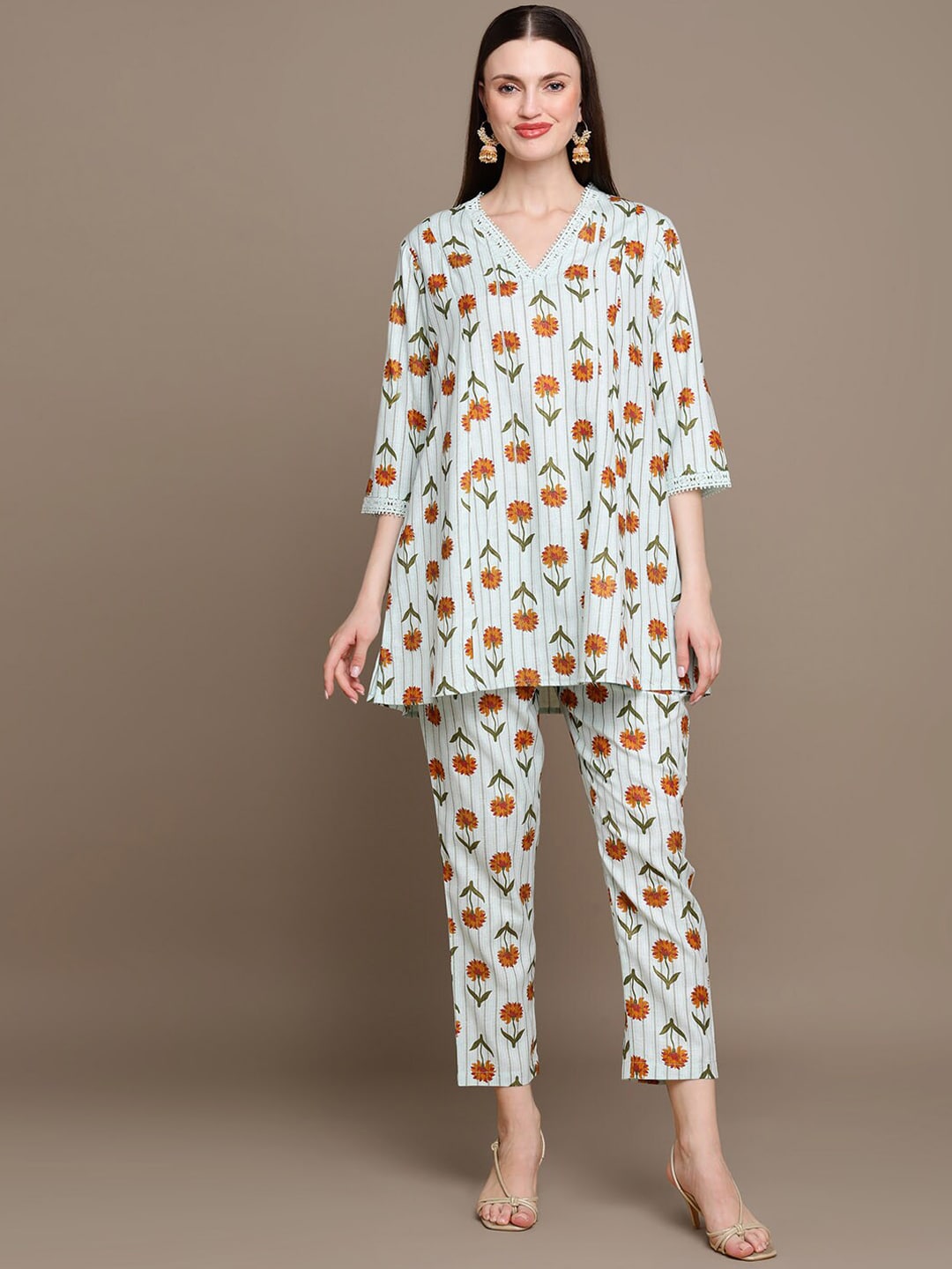 HERE&NOW Floral Printed Lace Inserted V-Neck Kurti with Trousers | Grocsy