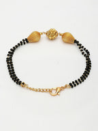 NVR Women Gold-Polished & Black Brass Hand Mangalsutra Link Bracelet | Grocsy