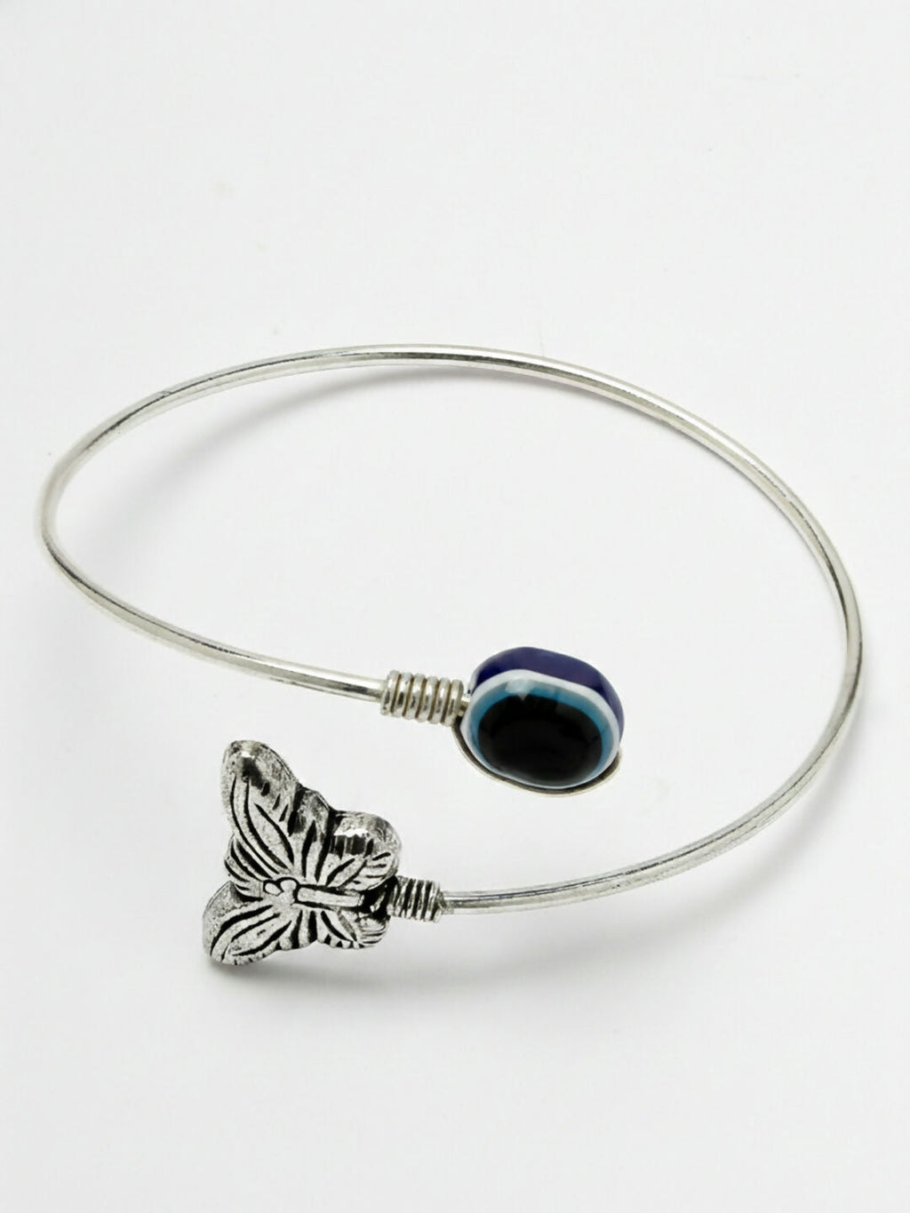 NVR Women Rhodium Plated Evil Eye Kada Bracelet | Grocsy