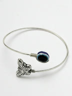 NVR Women Rhodium Plated Evil Eye Kada Bracelet | Grocsy