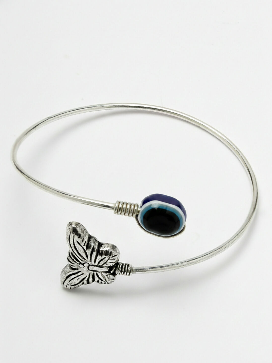 NVR Women Rhodium Plated Evil Eye Kada Bracelet | Grocsy