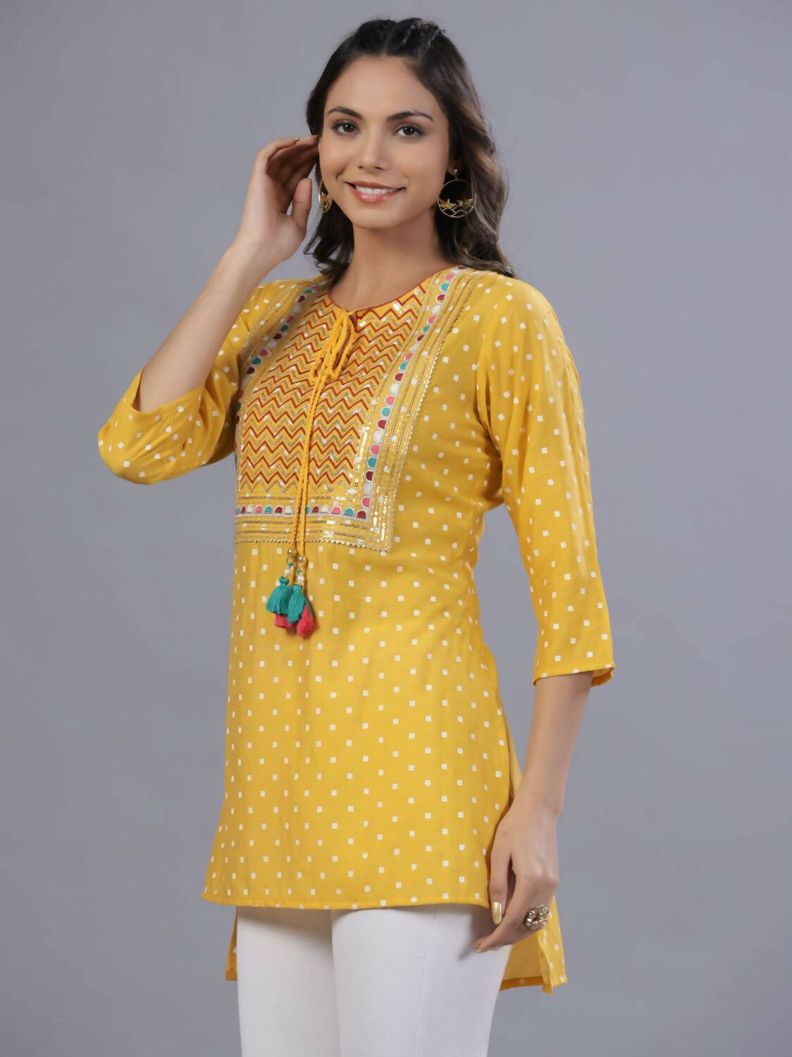 Juniper Women Yellow Muslin Printed High-Low Straight Tunic With Embroidered Yoke | Grocsy