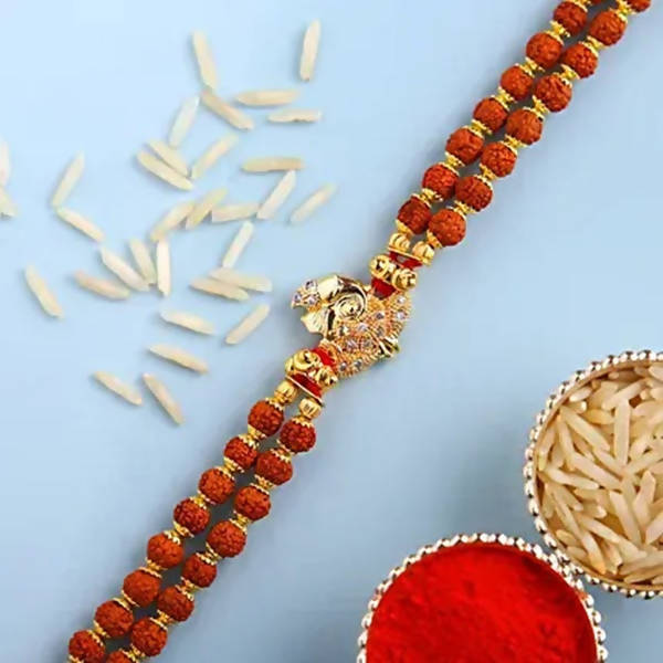 Ganesha Minimal Style Rakhi And Kaju Rolls Box | Grocsy