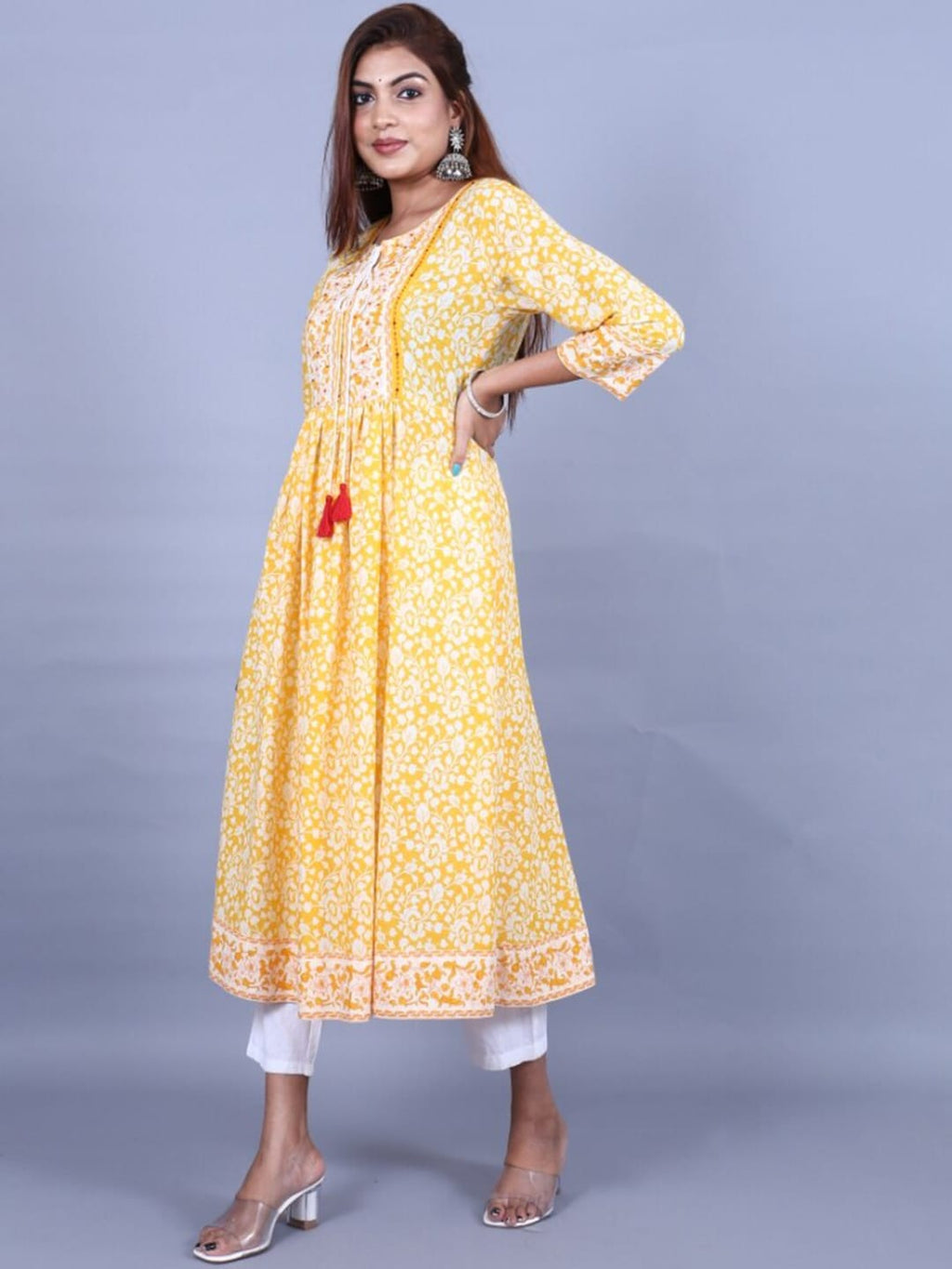HERE&NOW Women Yellow Floral Printed Sequined A-Line Kurta with Trousers | Grocsy