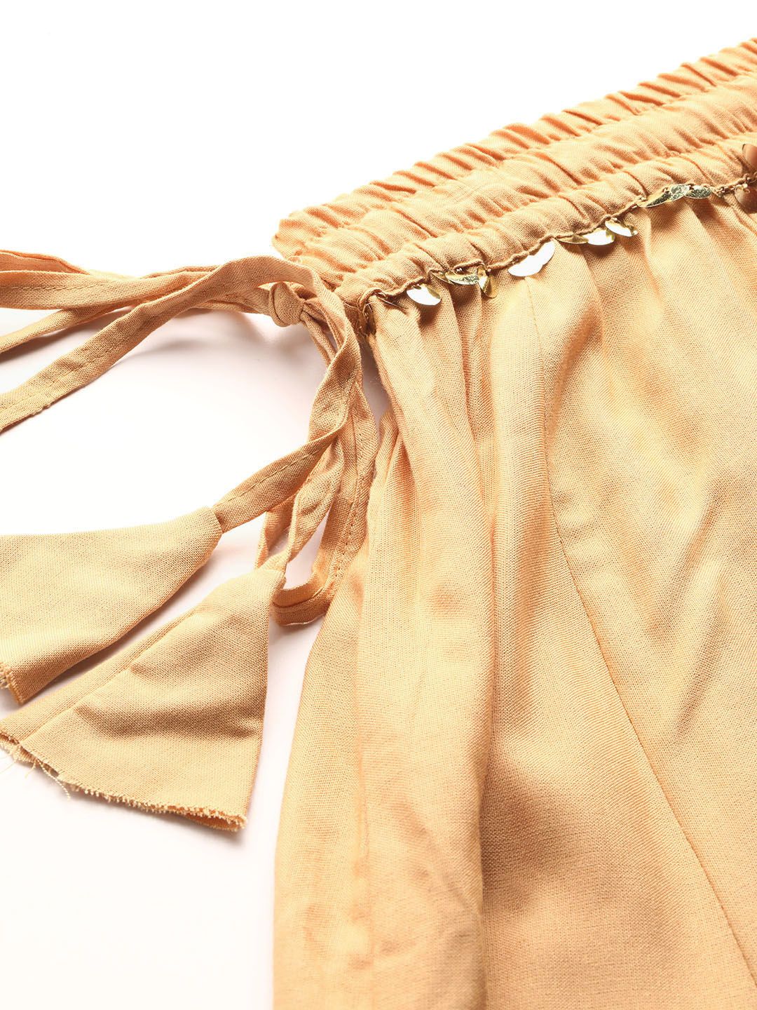 TAG 7 Women Beige Solid Flared Palazzos | Grocsy