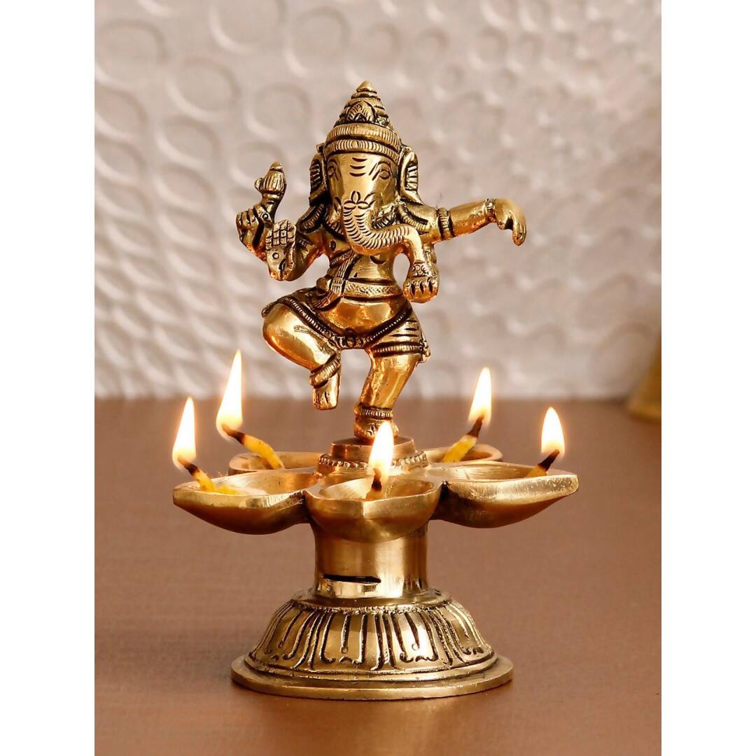 eCraftIndia Gold-Toned Handcrafted Dancing Lord Ganesha Showpiece With Diya | Grocsy