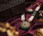 Jewel City Long Pearl Mala Golden Rainbow Diamond Studded Jumkee Tikka Necklace Set | Grocsy