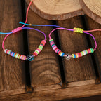NVR Women & Men Set of 2 Multicolor Evil Eye Rakhi With Roli Chawal | Grocsy