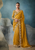 Monjolika Fashion Mustard Tissue Embroidered Sequins And Zari Work Saree | Grocsy