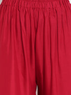 TAG 7 Women Maroon Solid Flared Palazzos | Grocsy