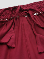TAG 7 Women Maroon Solid Flared Palazzos | Grocsy