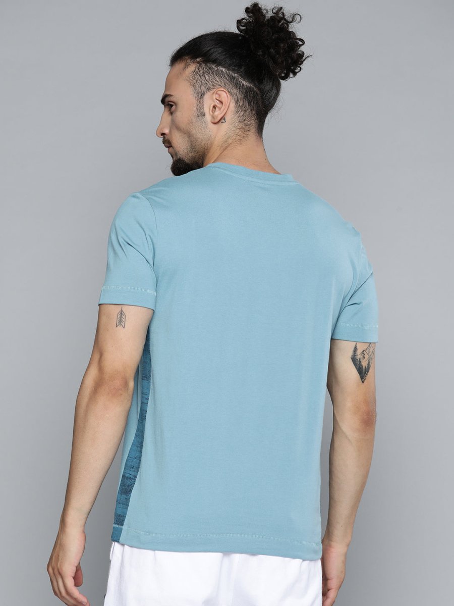 Alcis Men Blue Solid Slim Fit Gym T-shirt | Grocsy