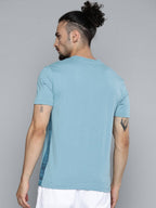 Alcis Men Blue Solid Slim Fit Gym T-shirt | Grocsy