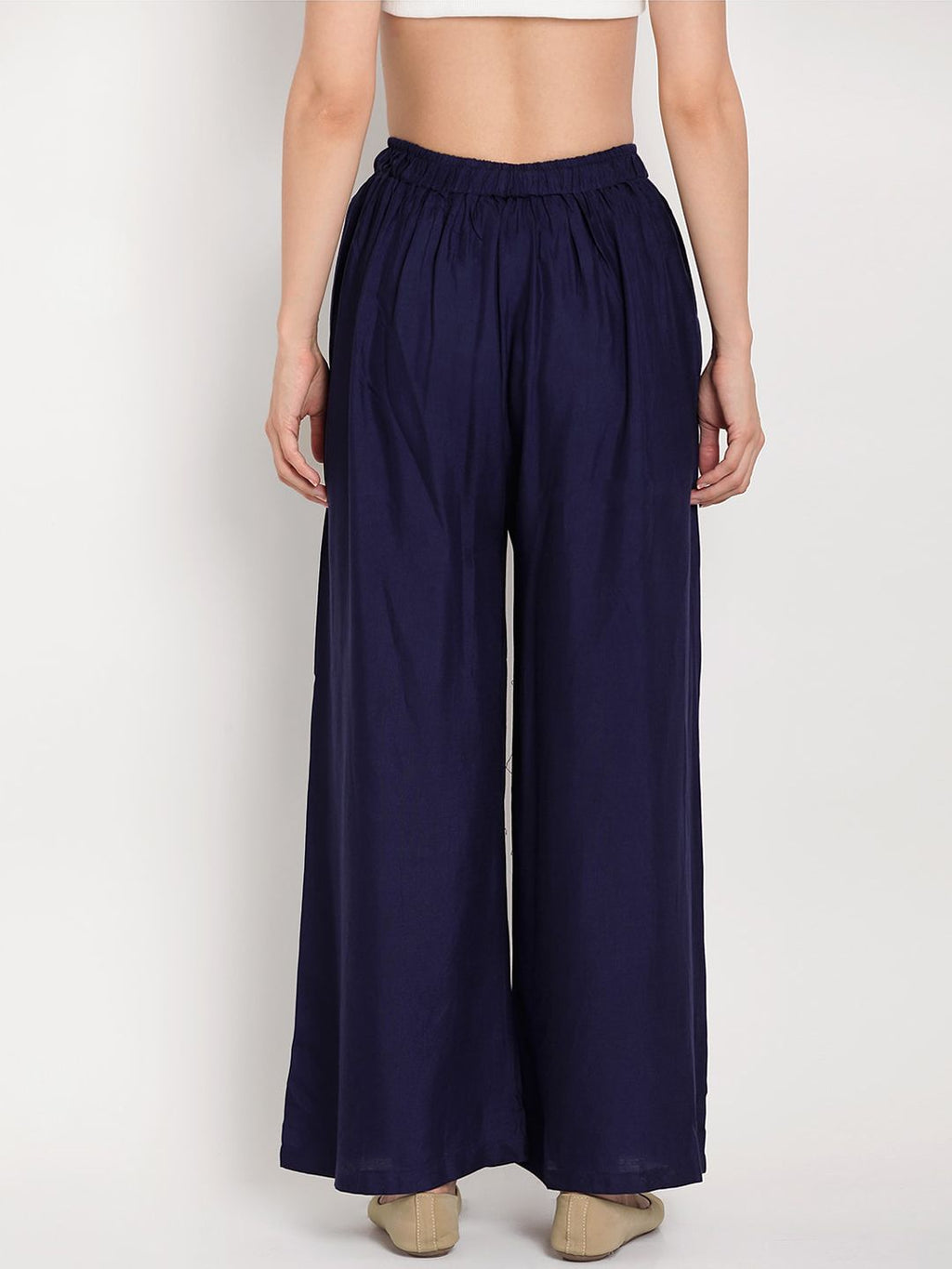TAG 7 Women Navy Blue Solid Flared Palazzos | Grocsy