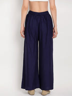 TAG 7 Women Navy Blue Solid Flared Palazzos | Grocsy
