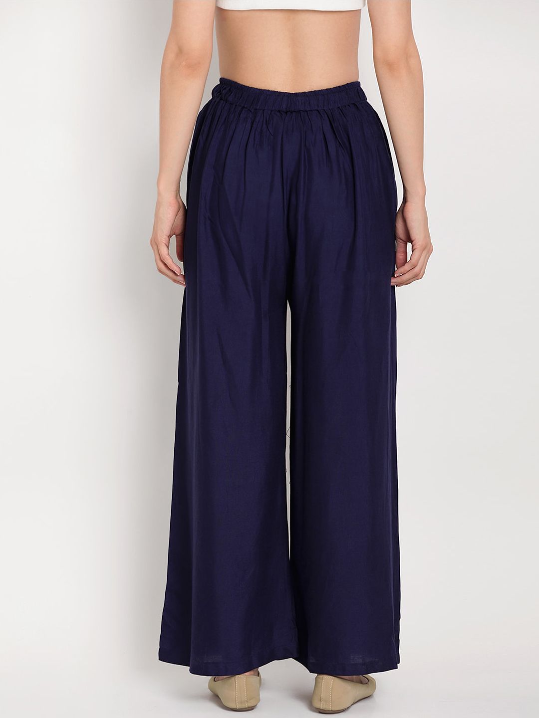 TAG 7 Women Navy Blue Solid Flared Palazzos | Grocsy