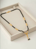 NVR Women Black Gold Plated Mangalsutra | Grocsy