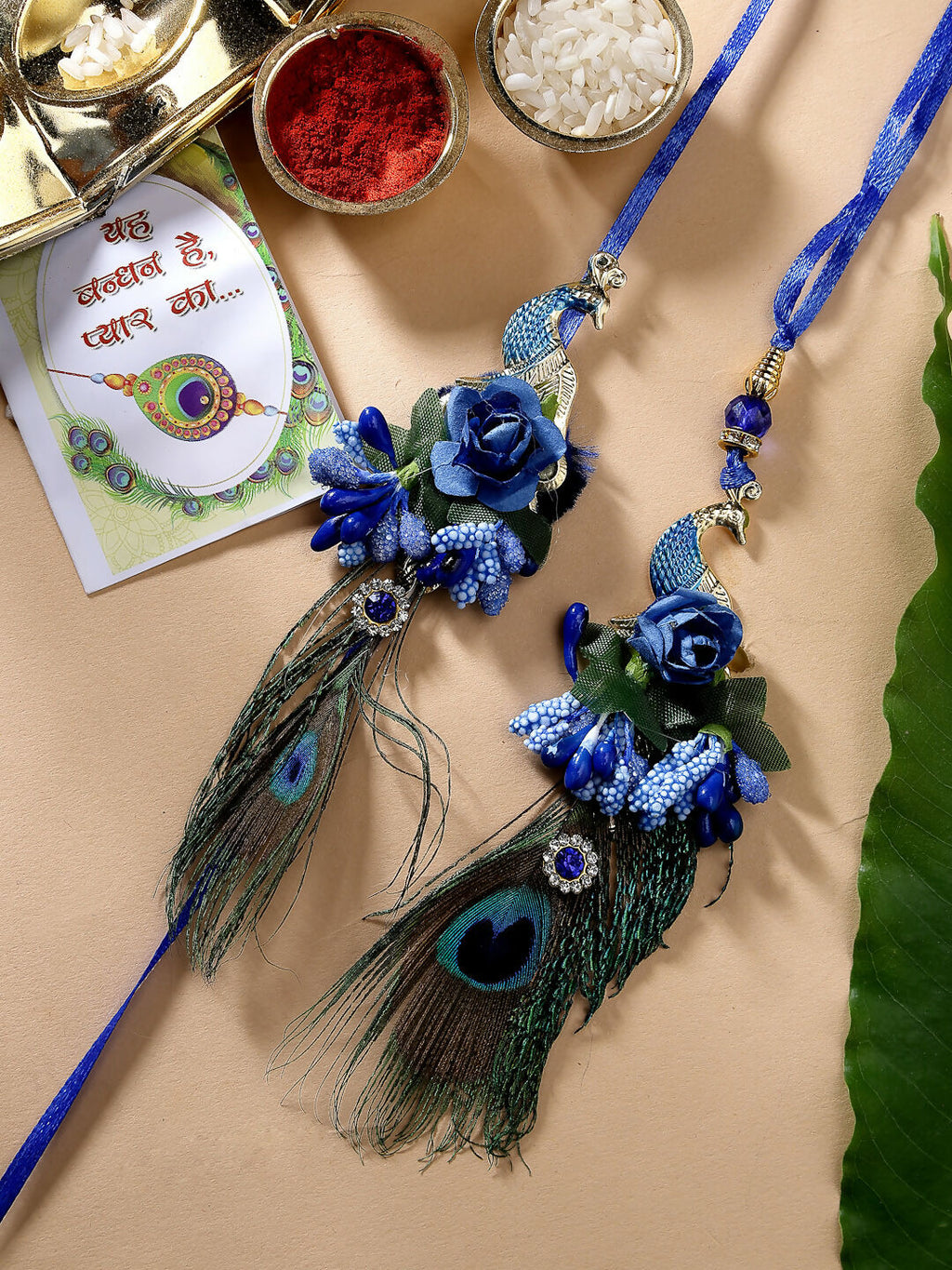 NVR Women & Men Set of 2 Blue Peacock Design Bhaiya Bhabhi Rakhi With Roli Chawal | Grocsy