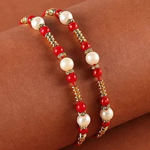 Set of 2 Pearl Rakhis With Cadbury Celebrations | Grocsy