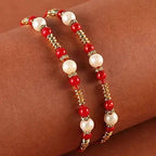 Set of 2 Pearl Rakhis With Cadbury Celebrations | Grocsy