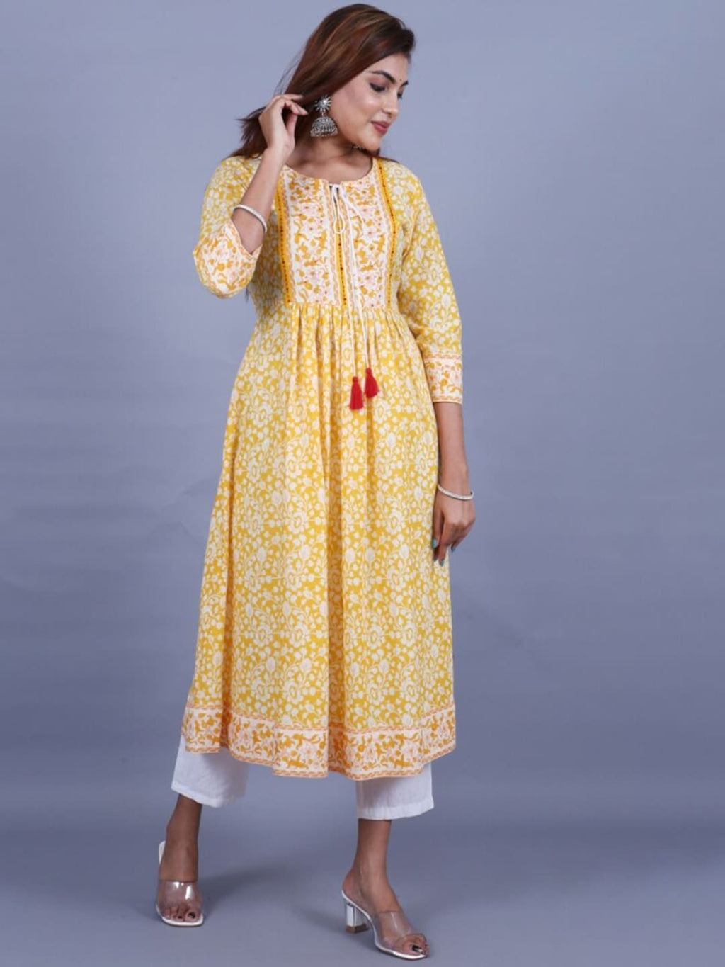 HERE&NOW Women Yellow Floral Printed Sequined A-Line Kurta with Trousers | Grocsy