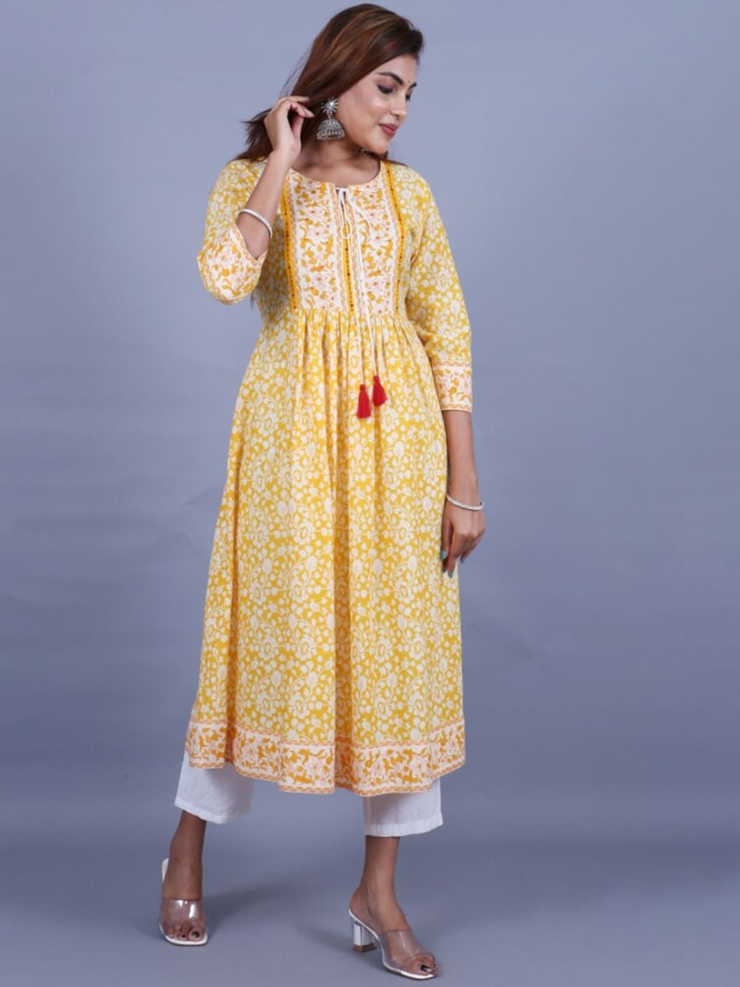 HERE&NOW Women Yellow Floral Printed Sequined A-Line Kurta with Trousers | Grocsy