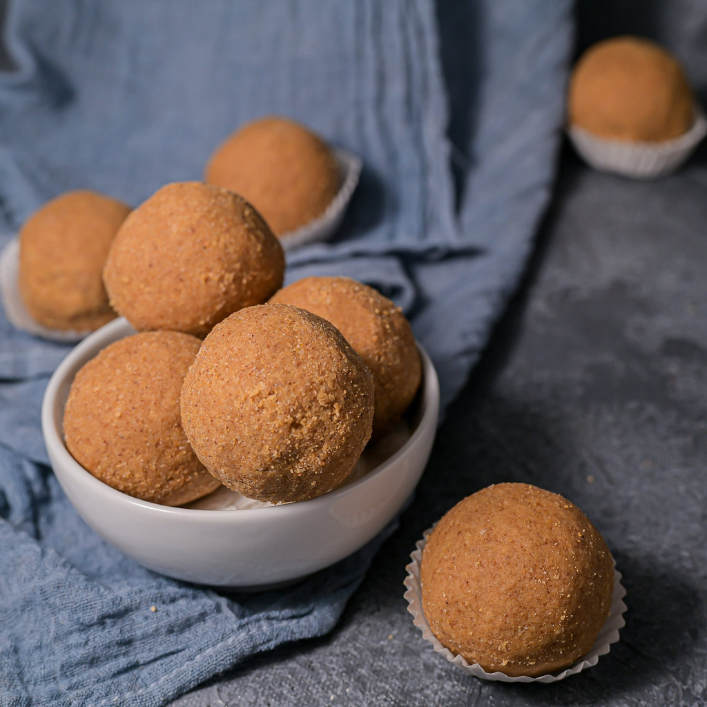 Vellanki Foods Bellam Sunnundalu (Jaggery) | Traditional & Healthy Sunnundalu made with with Urad Dal, Ghee & Jaggery | Grocsy