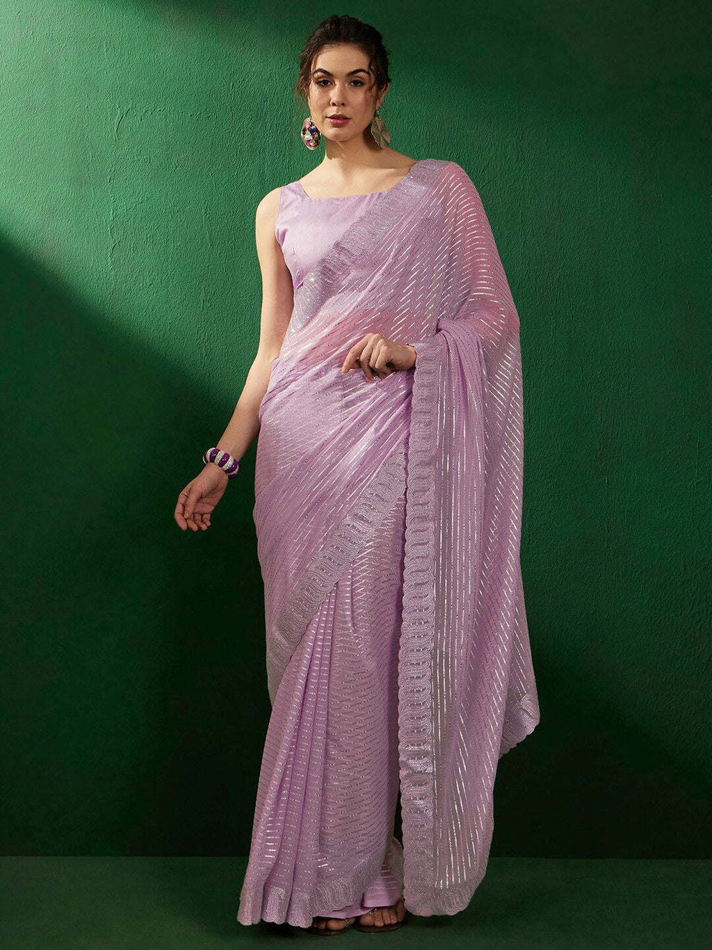 Sangria Mauve Embellished Pure Georgette Saree | Grocsy