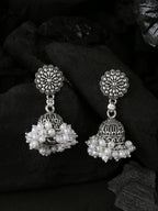 NVR Women Silver Toned Dome Shaped Jhumkas Earrings | Grocsy