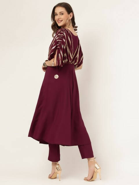 FIORRA Women's Wine Poly Crepe A-Line Kurta Set | Grocsy
