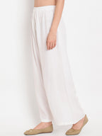 TAG 7 Women White Solid Straight Palazzos | Grocsy
