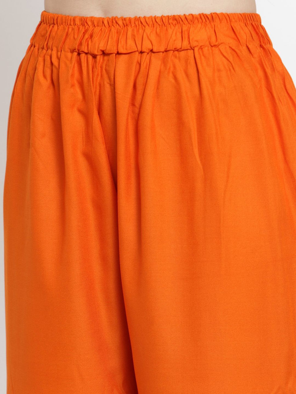 TAG 7 Women Orange Solid Wide Leg Palazzos | Grocsy