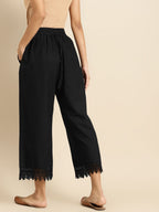 TAG 7 Women Black Solid Hem Design Straight Palazzos | Grocsy