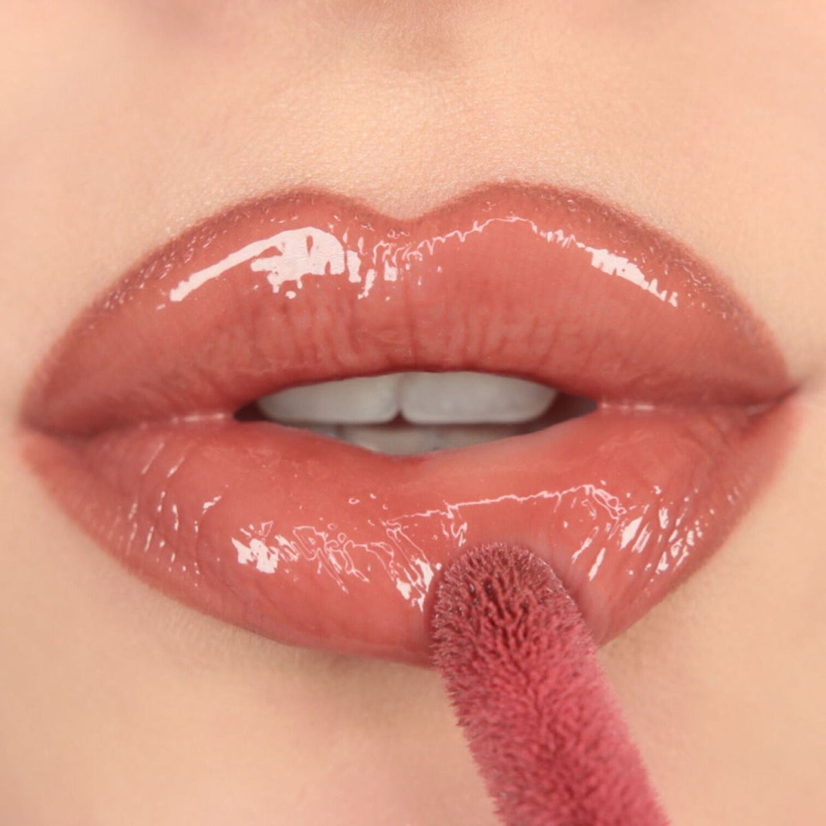Makeup Revolution Pout Bomb Plumping Gloss - Cookie | Grocsy