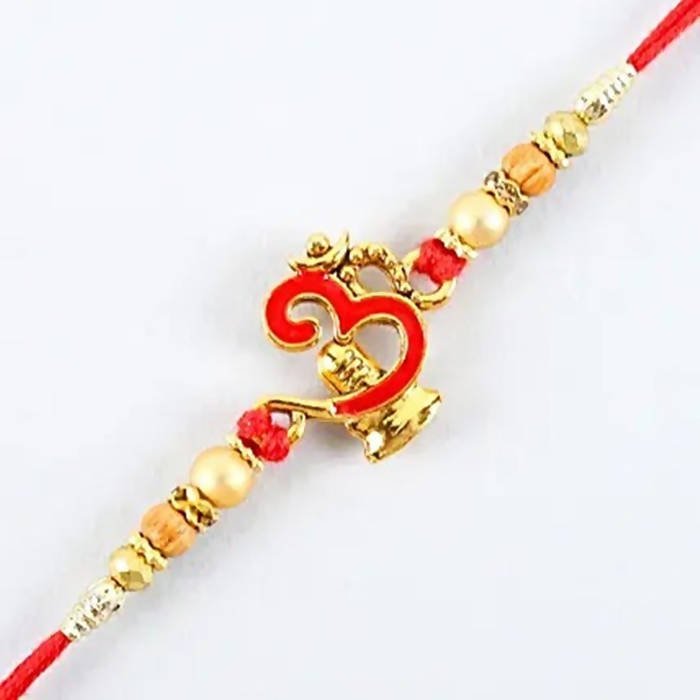 Auspicious Om Pearl Rakhi & Kaju Roll Box | Grocsy