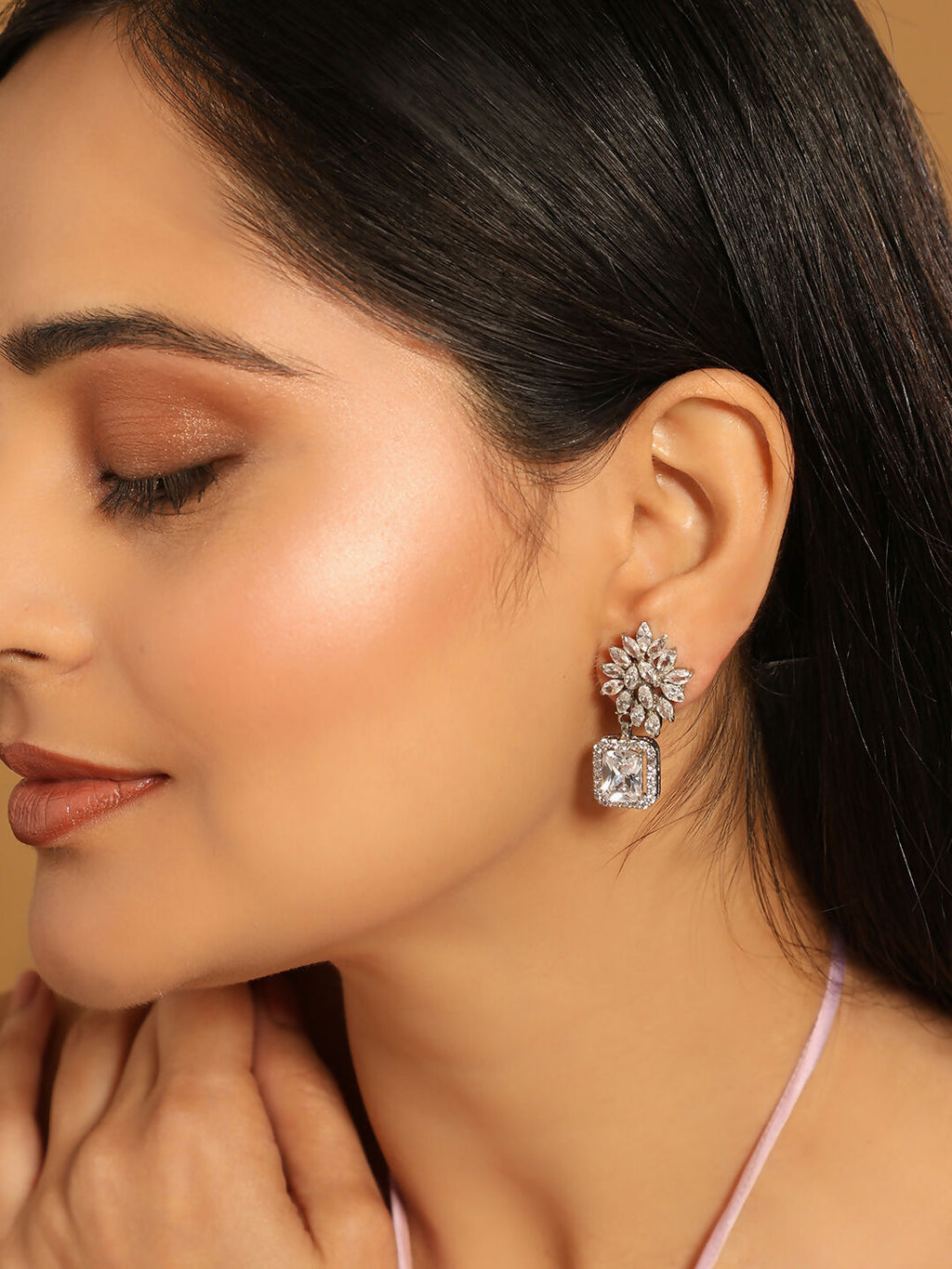 Nuyug Rhodium-Plated Rhinestone Studded Floral Minimal Cotemporary Studs | Grocsy