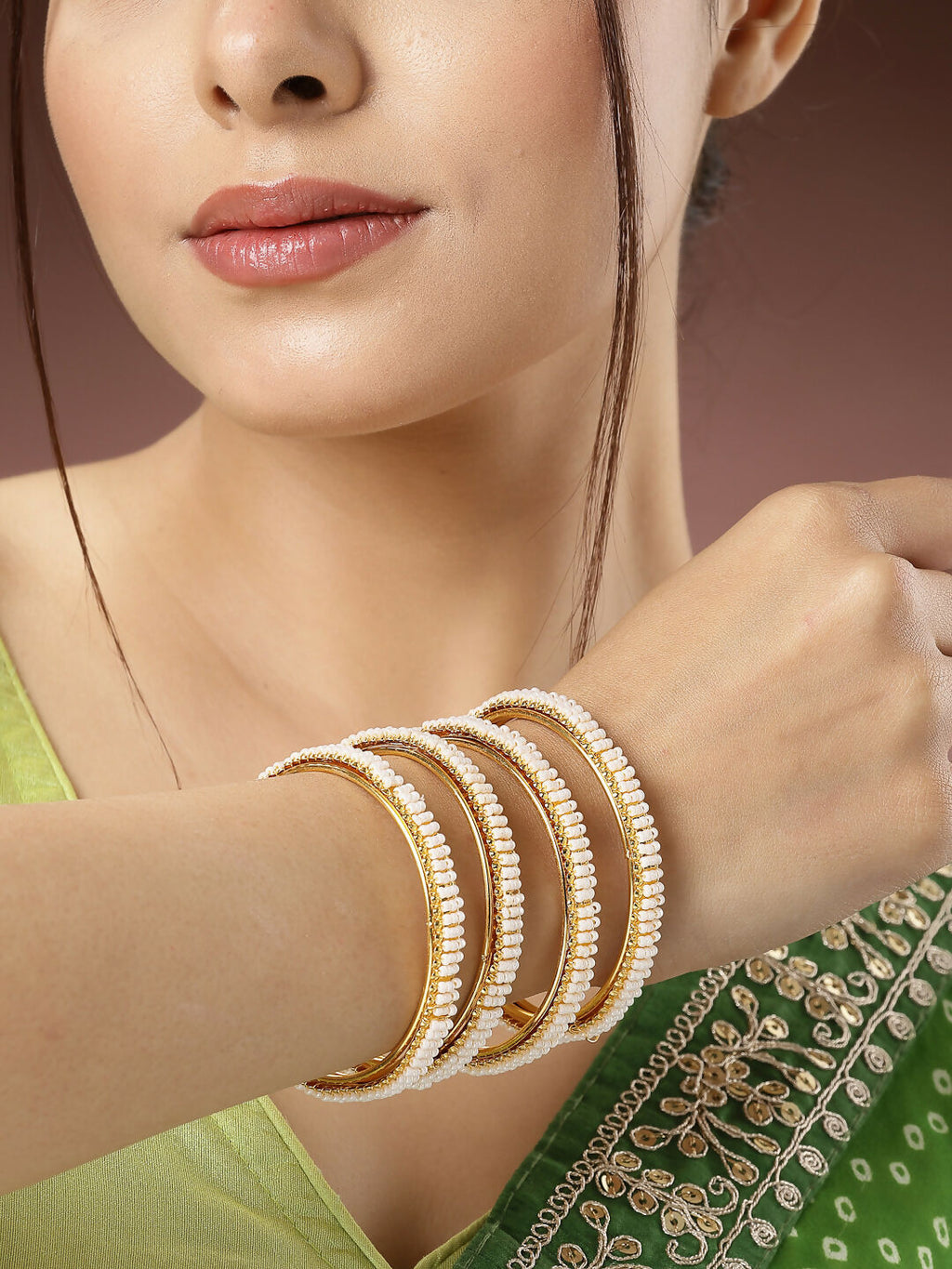 NVR Women's Set of 4 Gold-Polished Pearl Handcrafted Traditional Bangles | Grocsy