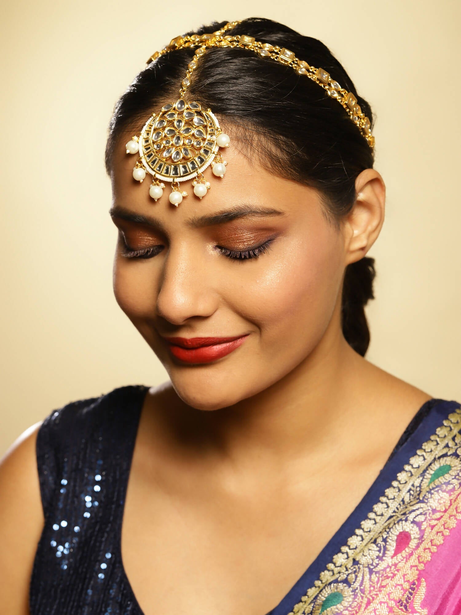 Gold-Polished White Kundan-Studded Pearl Beaded Matha Patti - Ruby Raang | Grocsy